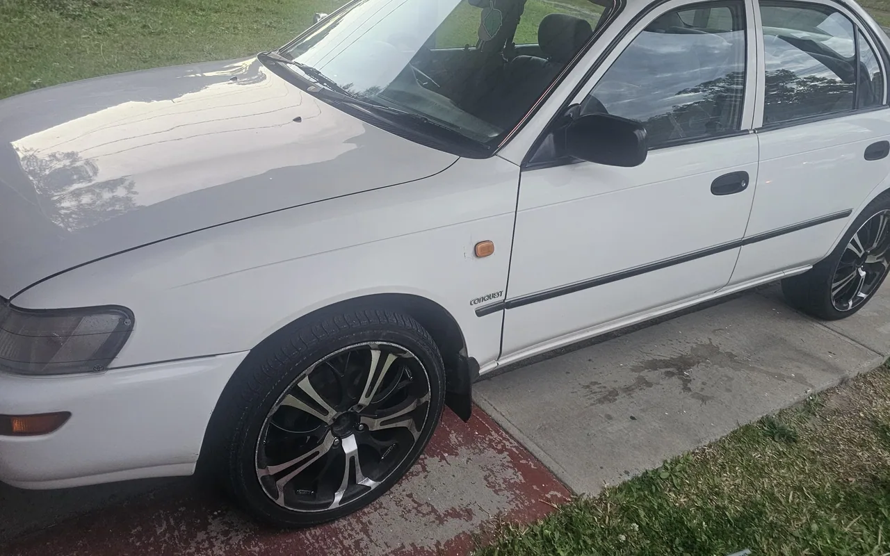 Silver Toyota Corolla previously purchased by AK Cash for Cars