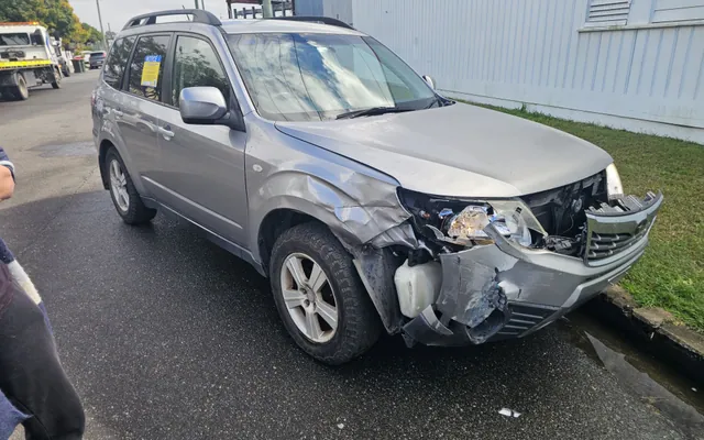 Damaged Subaru Forester from the AK Cash for Cars purchase collection